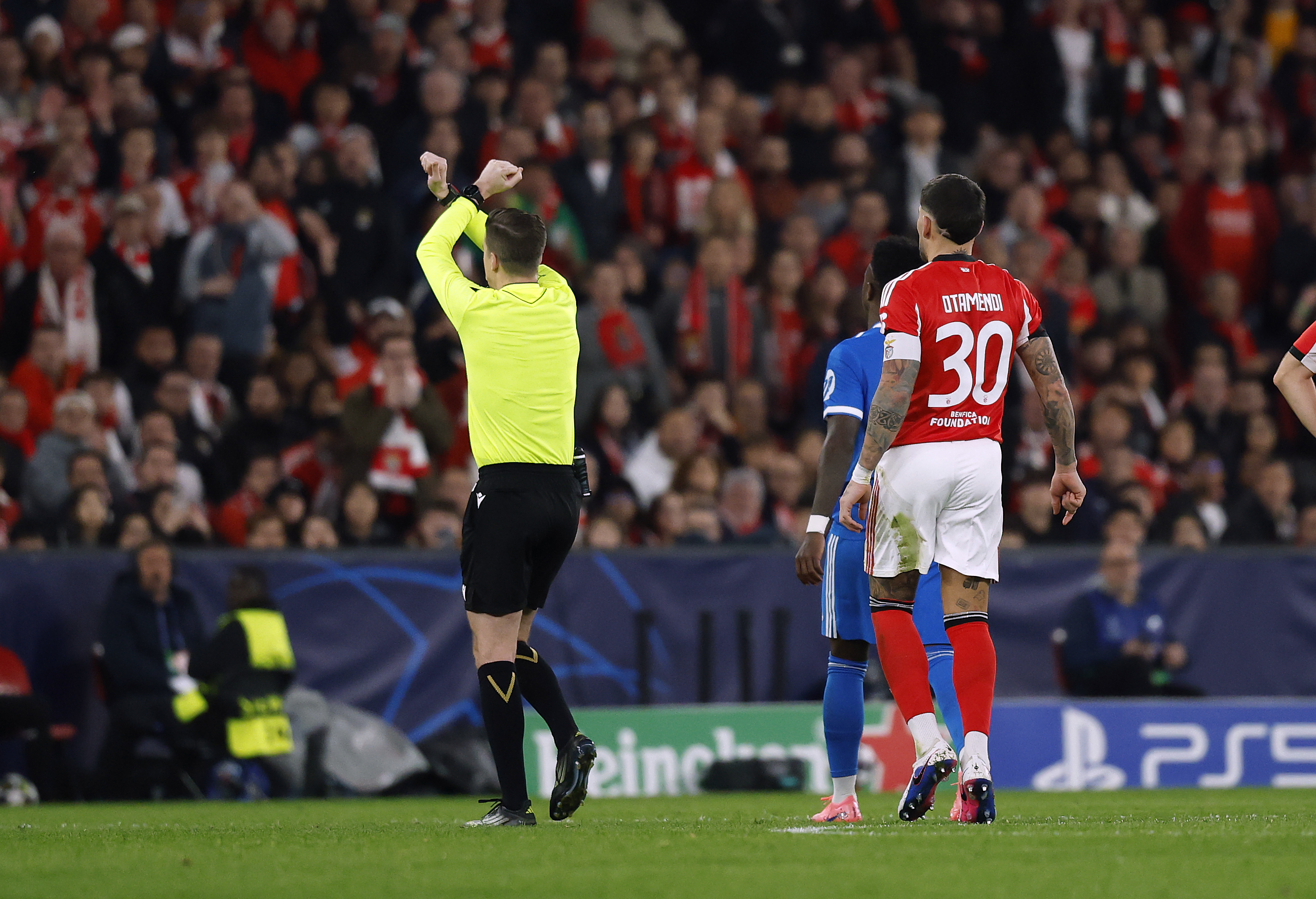 Referee activating anti-racism protocol