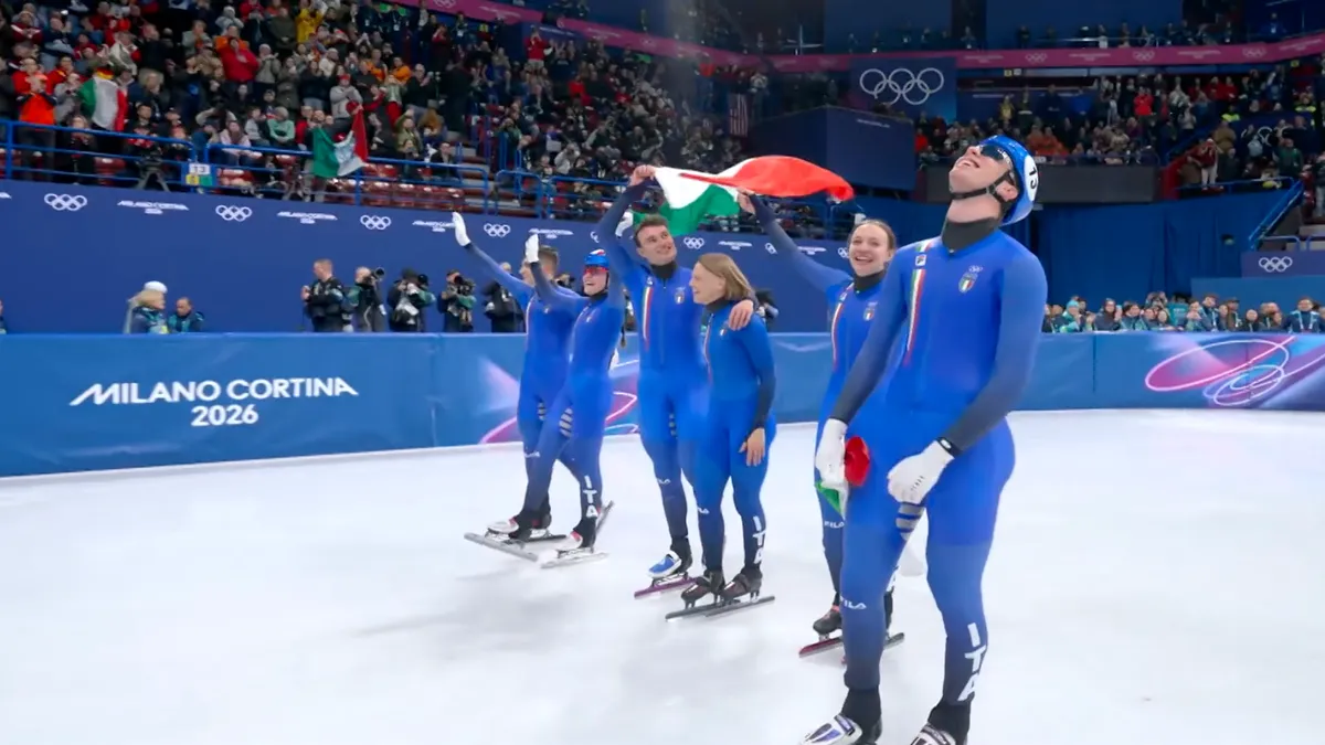 Italy celebrates mixed relay gold